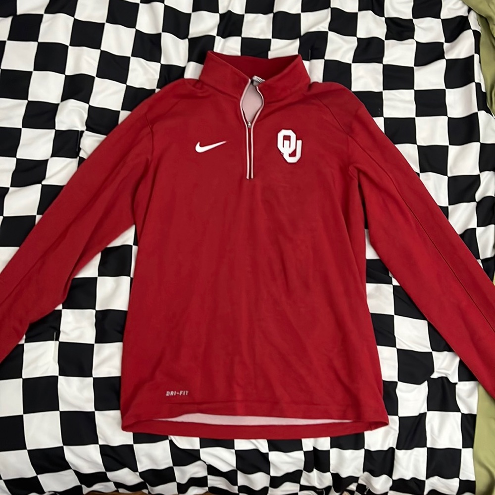 Here is a Nike pull over OU football size small very long good with leggings